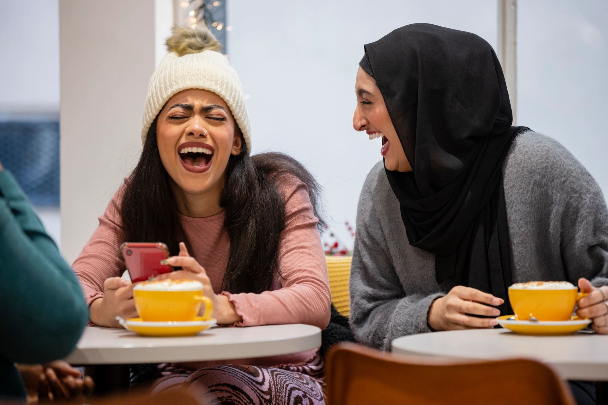 Community members in conversation during an educational gathering