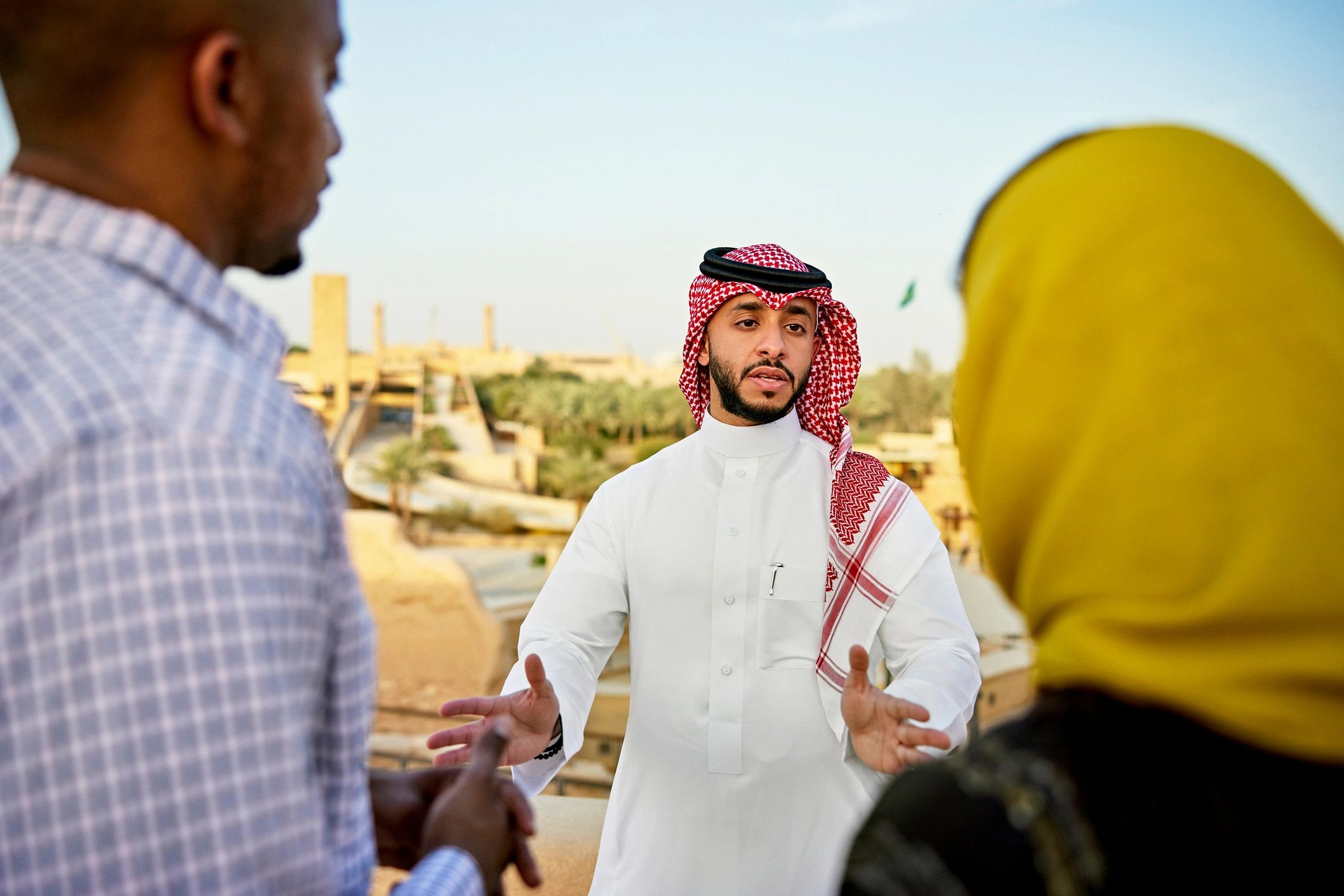 Community members listening during an educational gathering