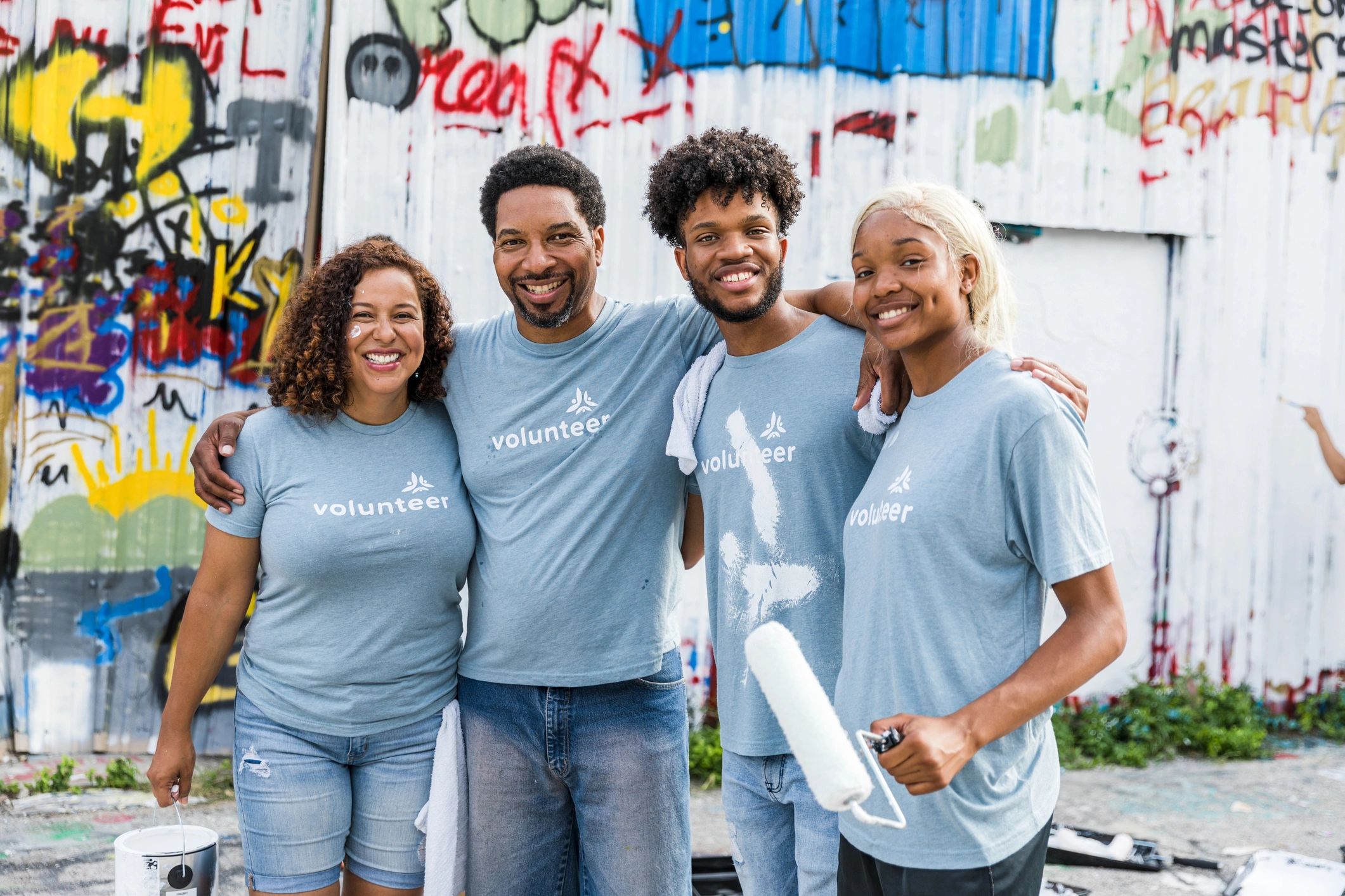 Smiling family at a volunteer community event