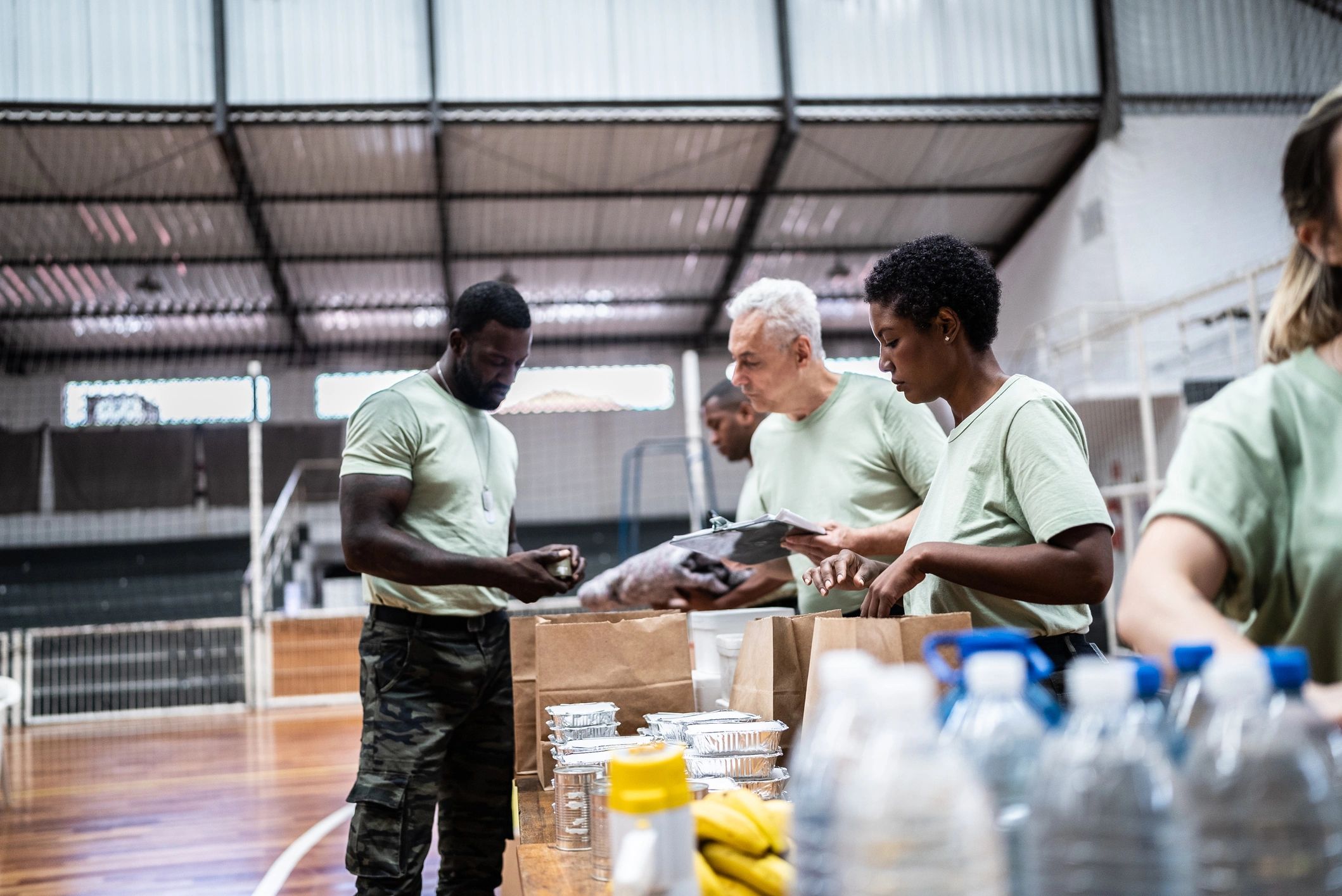 Volunteers organizing donations at a community event