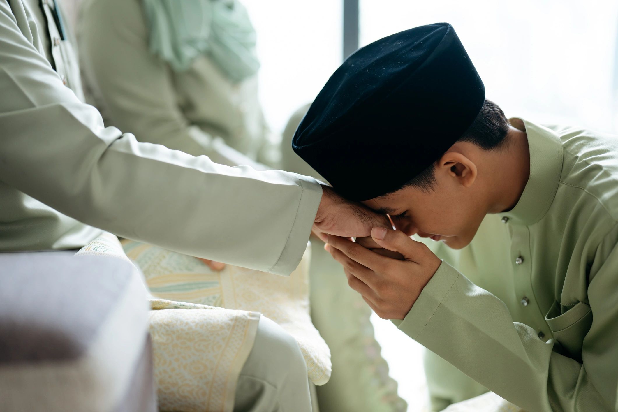 Muslim family sharing a respectful faith-centered moment together